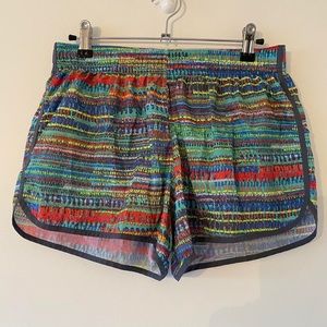 VSX multi-colored patterned running shorts💚